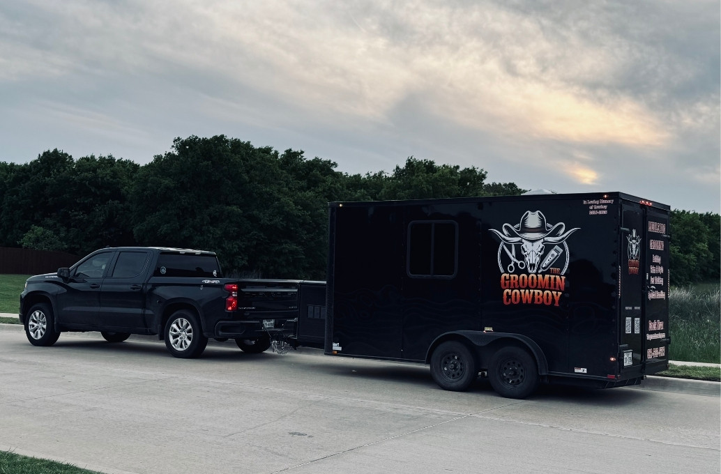black and white photo of a mobile dog grooming truck 
